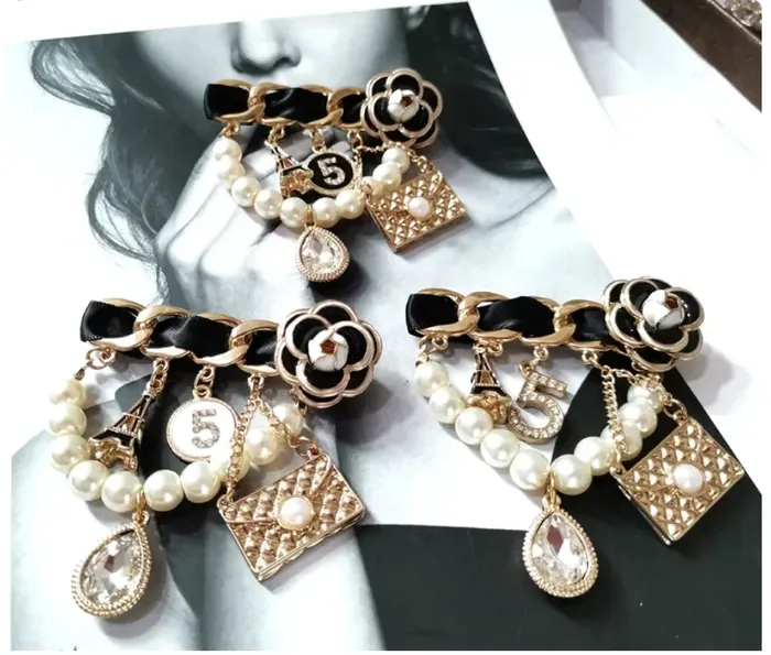 Pearl brooches for women camellia in the style of CHANEL
